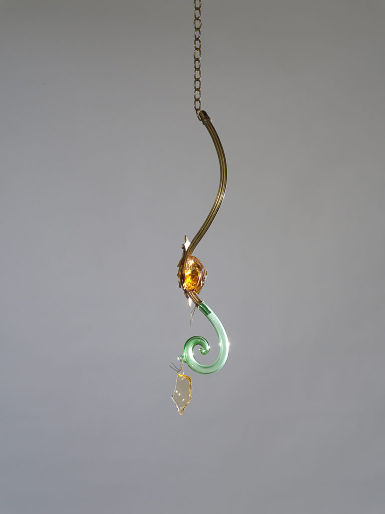 LABINAC Green and Brass, 2020, brass, Murano glass, steel, external spotlight appr. 112 / 51 (without chain) x 12 x 7 cm, designed by Jimmie Durham for LABINAC, ph: Nick Ash